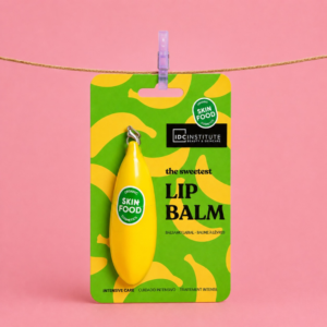 Bananų lūpų balzamas IDC Institute Skin Food drėkinantis lūpų balzamas